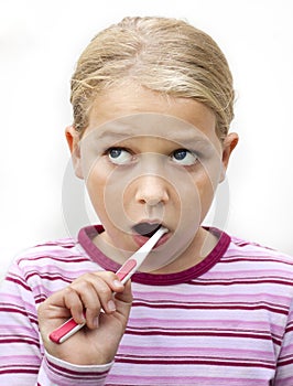 Girl brushing teeth