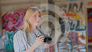 girl in a building with a camera