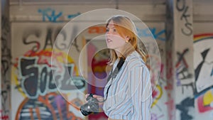 girl in a building with a camera