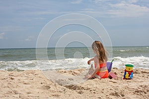 Girl building sand castle 2