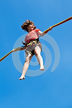 Girl on bungee cord