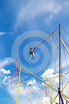 Girl on bungee cord device