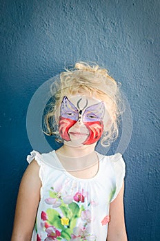 Girl with butterfly face painting