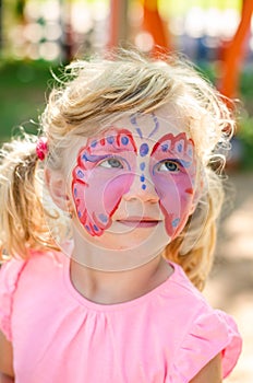 Girl with butterfly face painting