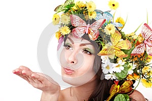 Girl with butterfly and flower on head.