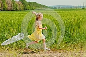 Girl with butterfly net having fun