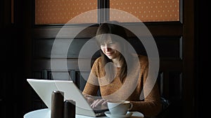 Girl at the Cafe with Laptop.