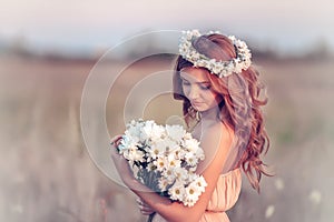 Girl in a camomile wreath