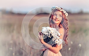 Girl in a camomile wreath