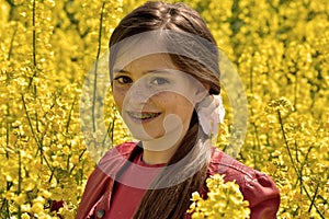Girl in canola field