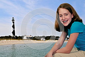 Girl at Cape Lookout Lighthouse photo