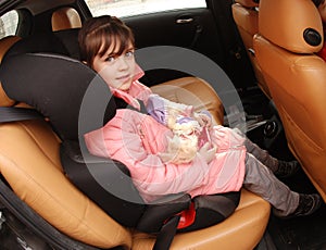 Girl in car seat