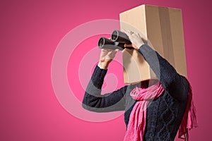 Girl with cardboard box head