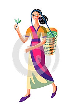 Girl carrying wicker basket with green tea leaves