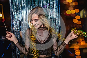 Girl celebrating new years eve at the nightclub.