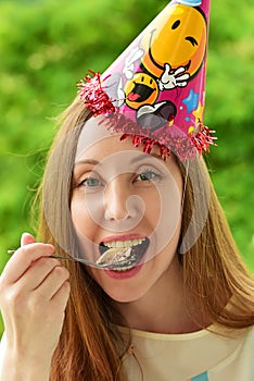 Girl in a celebratory cap