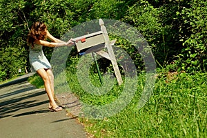 Girl Checking Mail