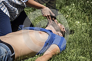 Girl checking man vital parameters