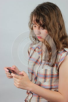 Girl checking smart phone