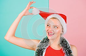 Girl cheerful face celebrate christmas. Woman with tinsel celebrate winter holiday christmas party. Woman in christmas