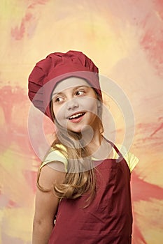 Girl in chef hat and apron