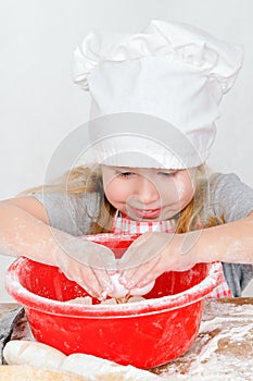 Girl in chef's hat