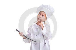 Girl chef white uniform isolated on white background. Holding the black ipad screen with one hand, and pointing finger