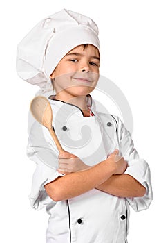 Girl chef with wooden spoon