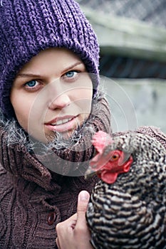 Girl with chiken, healthy life
