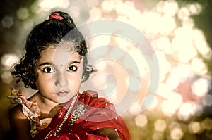 Girl child bride in red saree