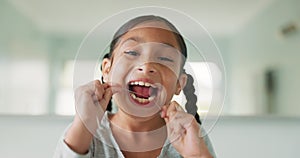 Girl child, floss and cleaning for dental hygiene, healthcare and wellness for healthy smile, tooth or mouth. Young