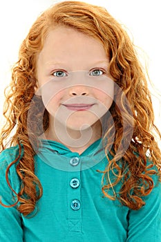 Girl Child with Orange Curly Hair and Blue Eyes