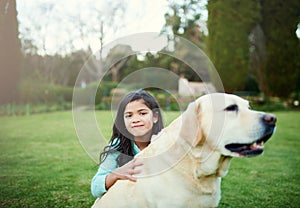 Girl child, portrait and happy with dog while outside, smile and animal care with puppy in garden. Kid, together and