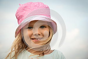 Girl child portrait. Little kid smiling face. Happy adorable and pretty young female head. Joy and happiness expression of