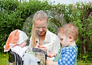 Girl and child in valise.