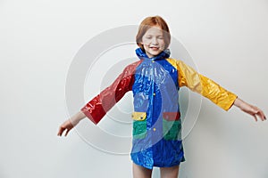 Girl children caucasian colorful cute kid little rain portrait childhood raincoat person background beauty young