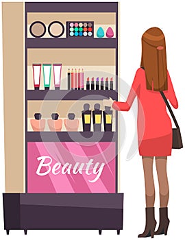 Girl chooses cosmetics in closet for skin care. Woman looking at make-up products on shelves