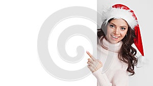 Girl with Christmas hat holding poster