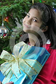 Girl with Christmas presents