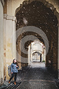 Girl in city old architecture