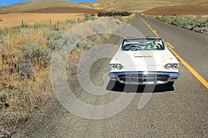 Girl in Classic 1960 Ford Thunderbird Convertible