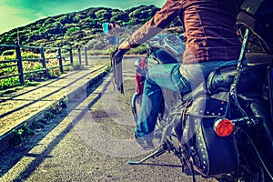 Girl on a classic motorcycle