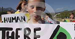 Girl with climate change sign in a protest