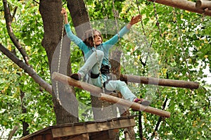 Girl in a climbing adventure activity park