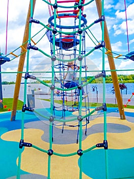 Girl climbing in adventure rope park