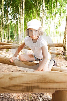 Girl Climbing Bars