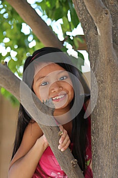 Girl Climbing Tree