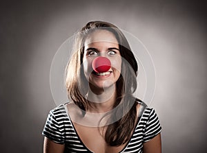 Girl with a clown nose