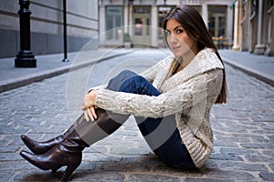 Girl on Cobblestone Street