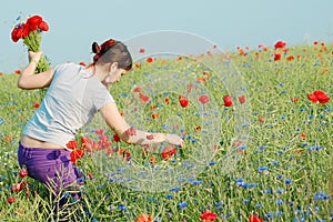 Girl collecting flowers